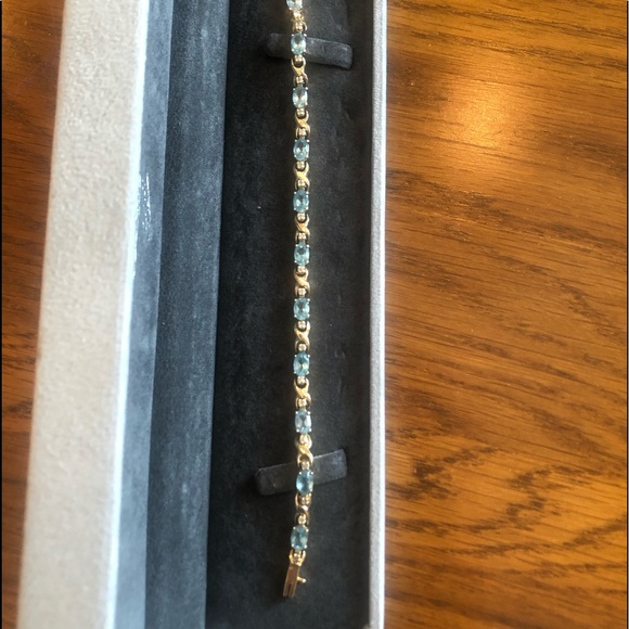 Blue Topaz & Diamond Tennis Bracelet set in Gold